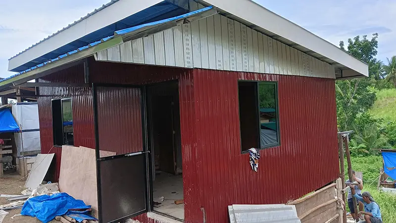 Construction work on a safer home for Chloe's family in Cebu